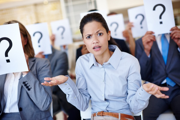 Photo of a woman who is confused, due to poor data.