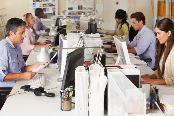 Photo of an office doing extra work.