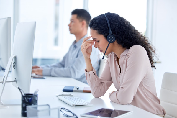 Photo of a woman struggling with customer support.