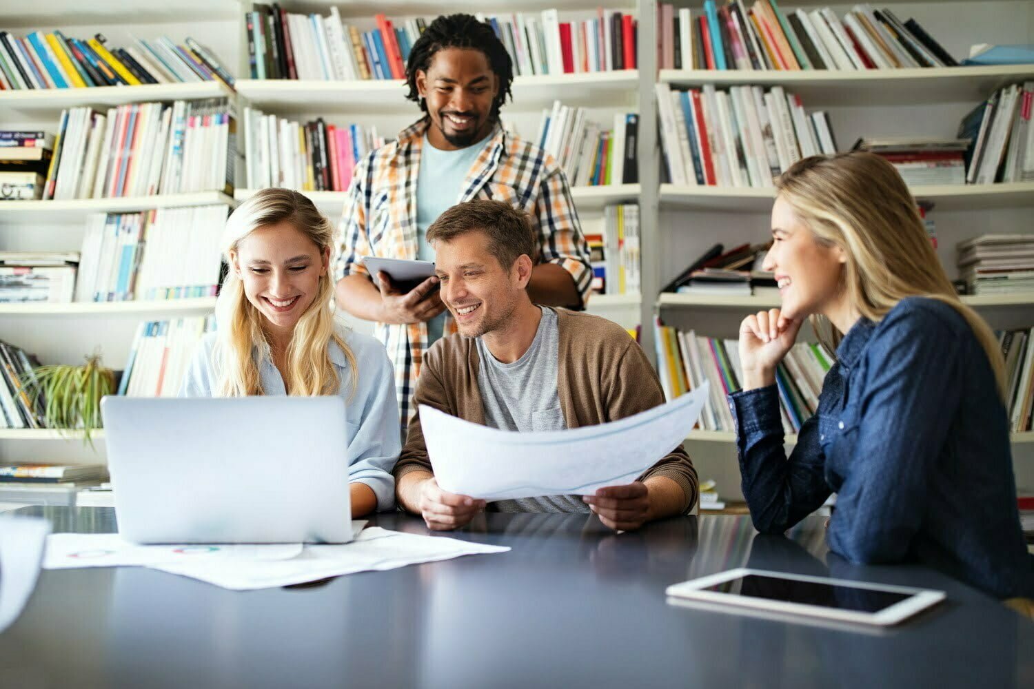 Group of software developers with clients