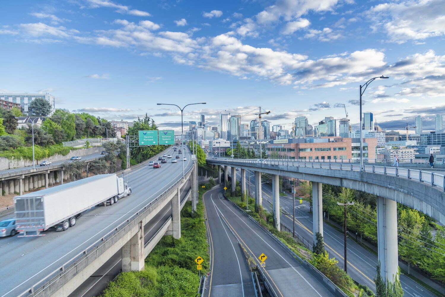 Cutom software for all industries, shows highways and industrial background