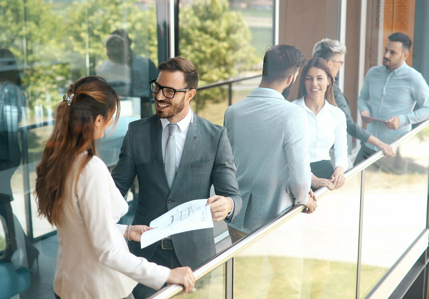 BSPOKE Software - Bussines people chatting within a professional service about custom software for their business