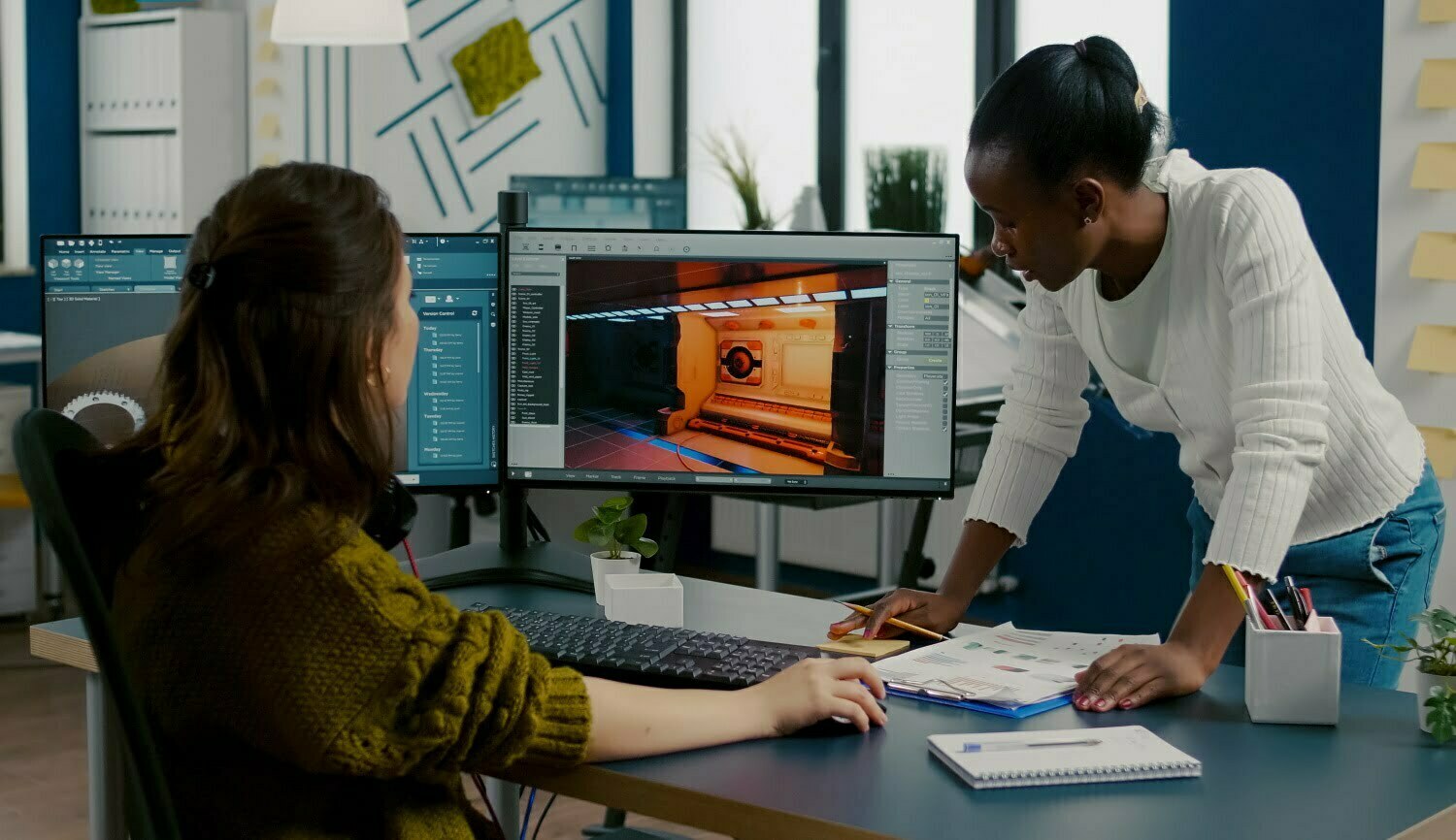 BSPOKE Software - Shows two developers testing custom software for a business project
