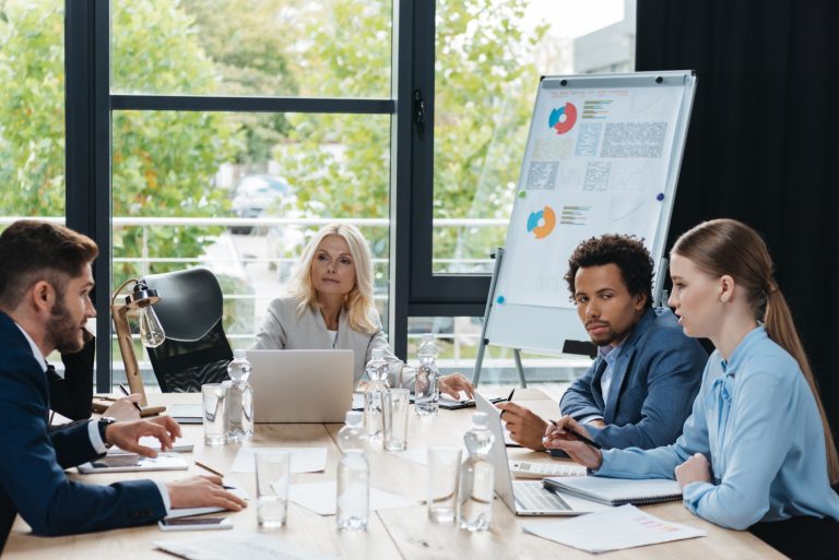 Group of business people discussing bespoke software for their business