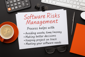 Photo of desk coffee, keyboard, calculator, with white paper and Software Risks Management written on it with a list of how this process helps.