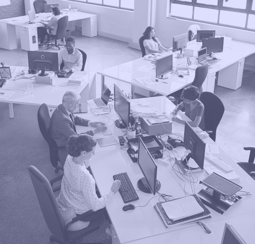 Photo of a purple tinted saturated office environment.